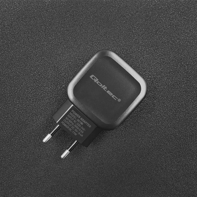 Qoltec 50188 universāls lādētājs klēpjdatoriem, viedtālruņiem, viedpulksteņiem, planšetēm, telefoniem, melns, AC/DC iekštelpām