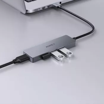 USB centrmezgls Aukey CB-H36 — 4 porti USB 3.2 Gen 1 Type-A, resursdatora USB 2.0, 5000 Mbit/s, alumīnija sudraba
