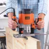 Router/Trimmer Black & Decker KW1200EKA-QS — kompakts maršrutētājs ar regulējamu dziļumu un ergonomisku dizainu