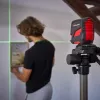 Lāzera līmeņrādis Einhell TC-LL 2 G — pašizlīdzinošs zaļš krusts un 360° līnija
