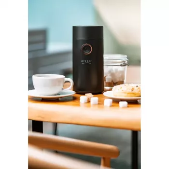 Kafijas dzirnaviņas ar dzirnakmeņiem Adler AD 4446bg — 150 W, 75 g pupiņu tvertne, nerūsējošā tērauda dzirnakmeņi, pogas vadība, melna
