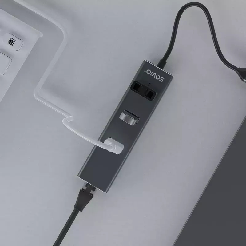 USB-C centrmezgls SAVIO AK-57 ar 3× USB-A, RJ-45 Gigabit Ethernet (5000 Mbit/s), alumīnija pelēks