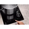 Indukcijas plīts virsma Electrolux LIT30230C — 2 zonu iebūvējama, 29 cm platums, melna, skārienjutīga vadība, 210/145 mm zonas