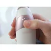 HoMedics Radiance ādas vakuuma mikroderīmabrāzijas ierīce rožu zeltā, baltā