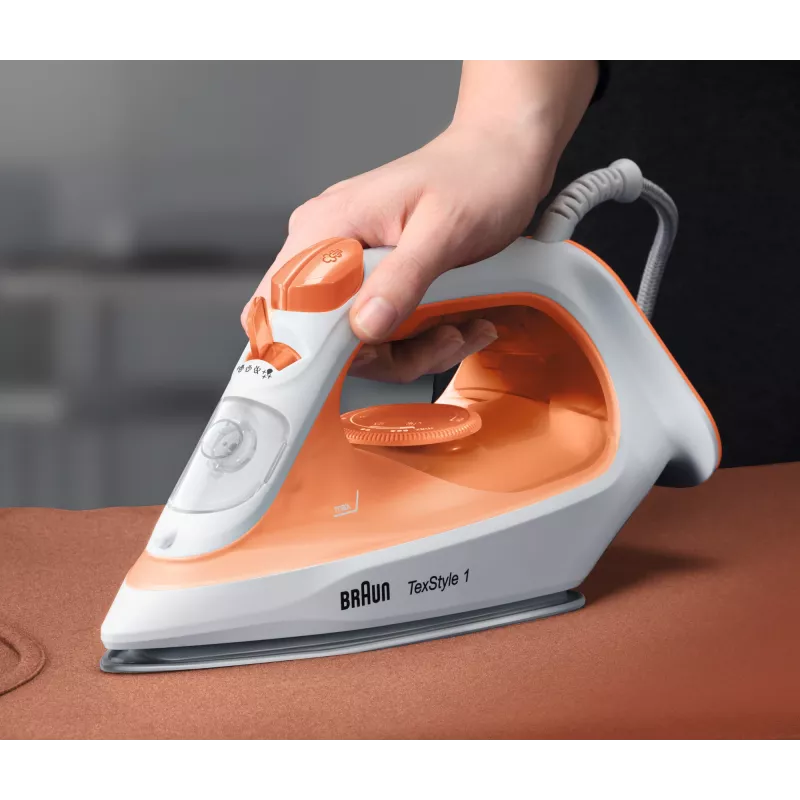 Braun TexStyle 1 SI1009OR Tvaika gludeklis ar nelipīgo zoli 1900 W Oranžs, Balts