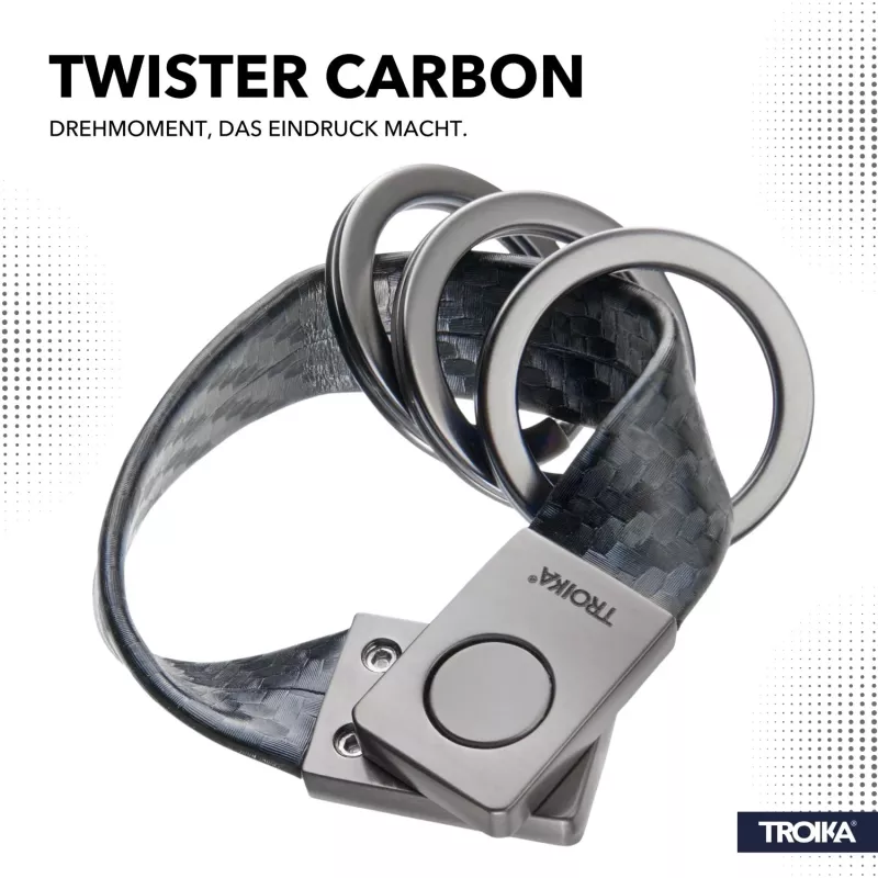 TROIKA TWISTER CARBON atslēgu piekariņš ar izvelkamo un pagriežamo mehānismu, hromēts metāls un oglekļa šķiedra, 4 sadalītie gredzeni KRG649/CB