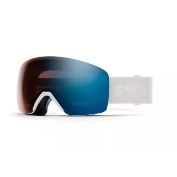 Smith Skyline slēpošanas brilles ar ChromaPop fotohromatiskām lēcām, White Vapor rāmis un Blue Sensor Mirror lēcas